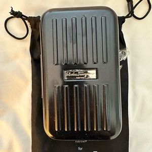 EVA AIR’s Salvatore Ferragamo Toiletry Case 7”x4.25”x2.50” in Black color.